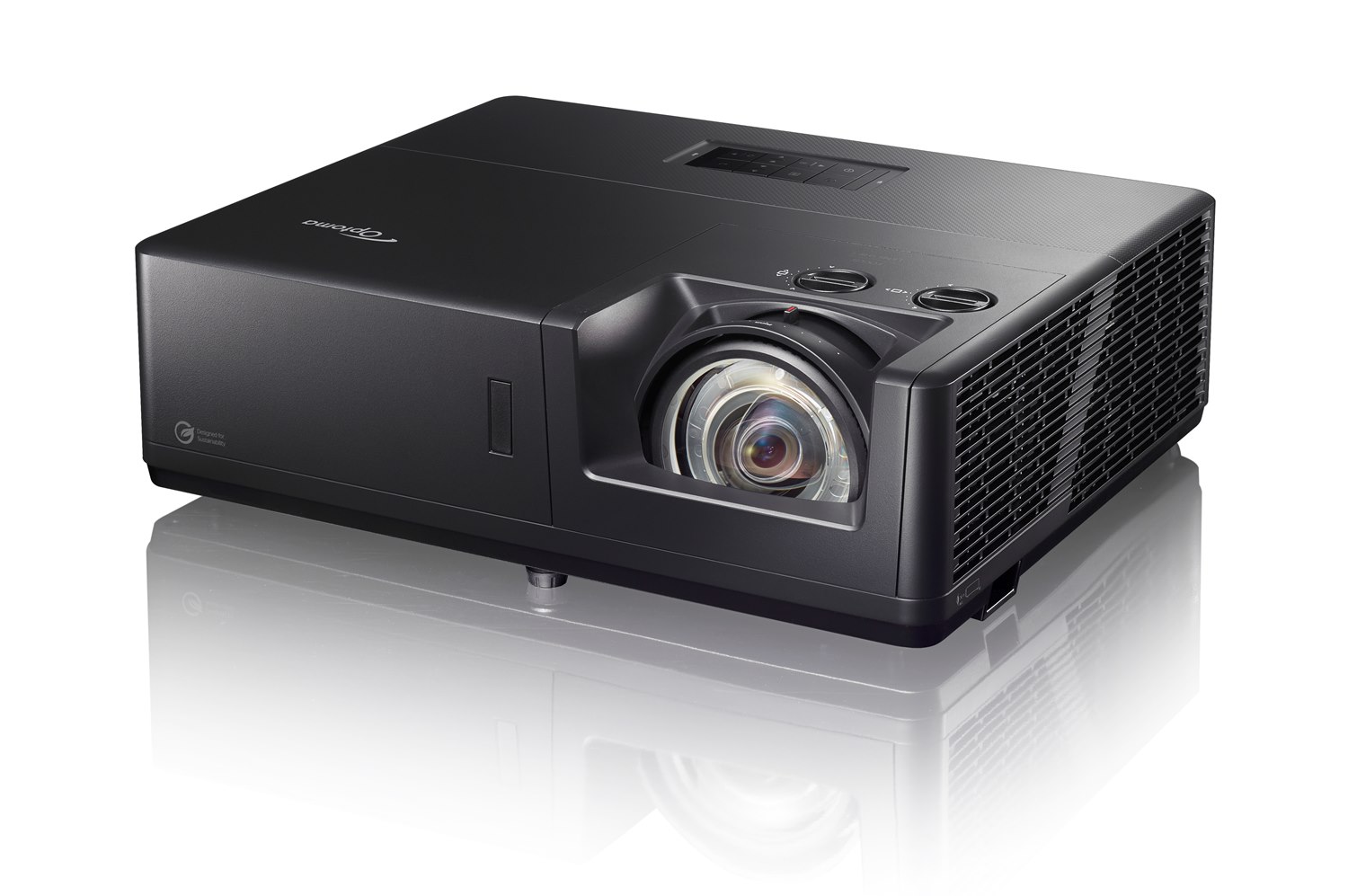 Optoma ZK608TST front three-quarter view from the left, black chassis with the short-throw lens and two lens-shift dials on top