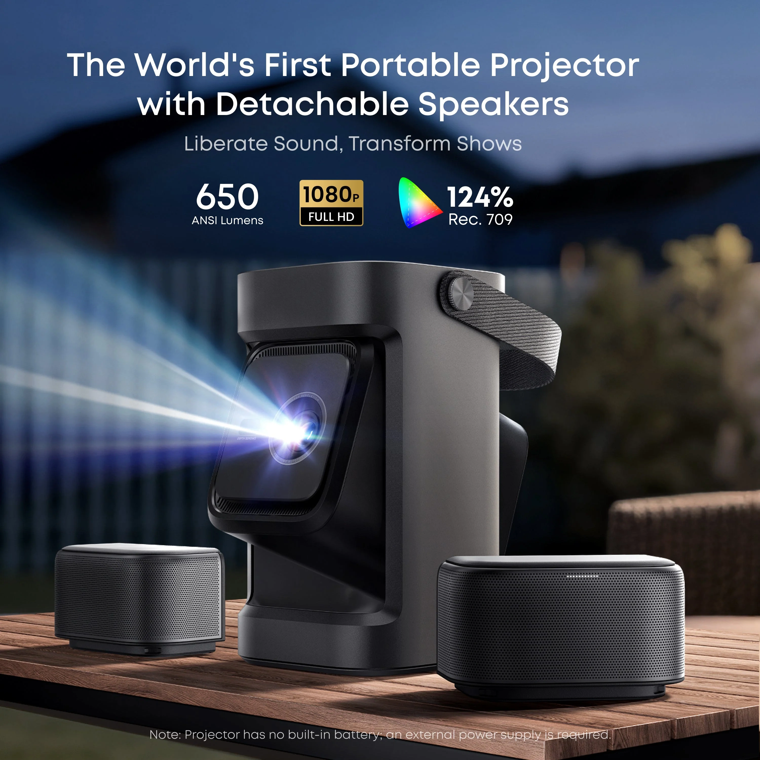 Nebula P1 portable projector in dark grey with a carry handle, projecting a beam from the front lens, with two detachable speakers on a wooden table outdoors