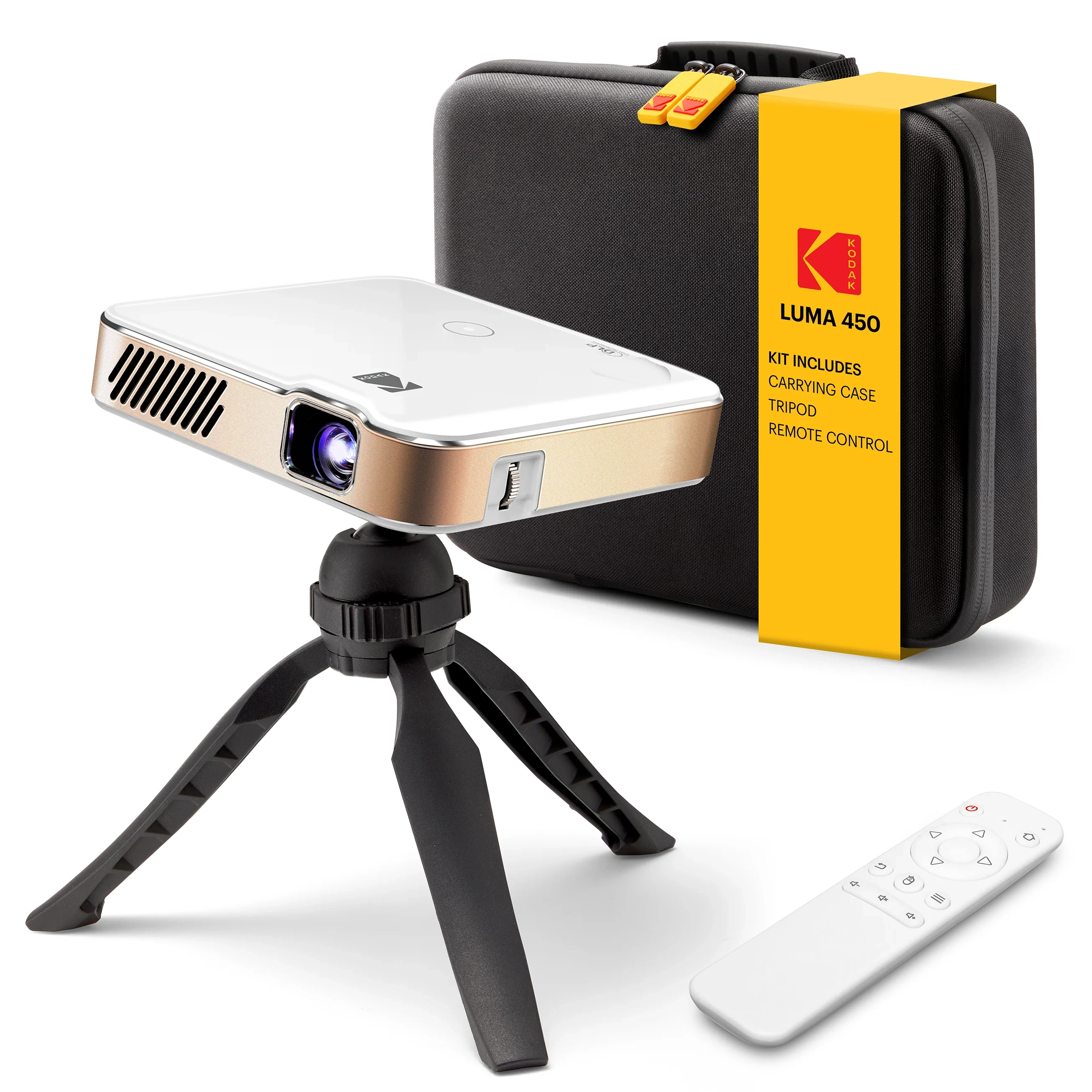 Kodak Luma 450 white projector with gold side panel on its tabletop tripod, beside the black carrying case and remote